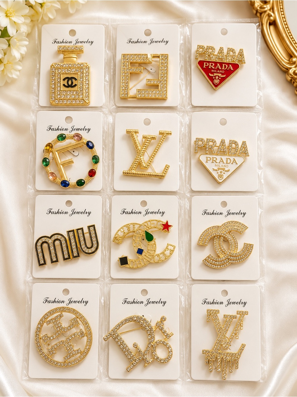 Assorted Gold-Tone Designer Logo Brooches – Gold